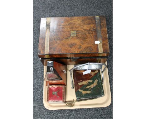 A tray of Victorian walnut writing box, gong and beater, metronome, lacquered wooden box and vintage tin containing buttons