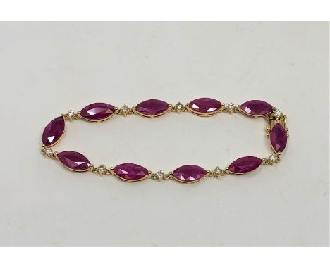 A 14ct yellow gold ruby and diamond bracelet, set with ten marquise-cut rubies (14.47 carats) and ten brilliant-cut diamonds 