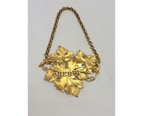 A very fine quality Georgian cast silver gilt sherry decanter label