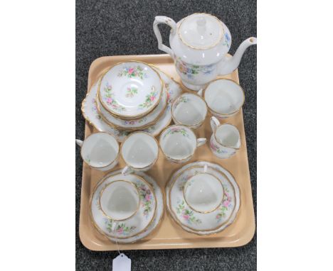 A tray of twenty-one piece Rosaline bone china tea service and a further floral pattern bone china teapot 