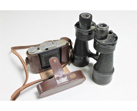 A set of Bino Prism No.5 field glasses together with a vintage leather cased camera