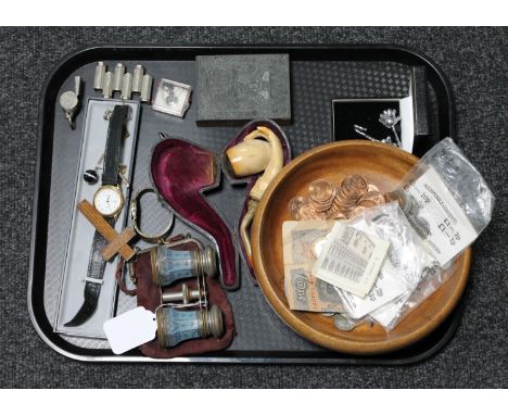 A tray of antique opera glasses, wooden bowl containing mid 20th century half pennies, foreign coins and banknotes, Meerschau