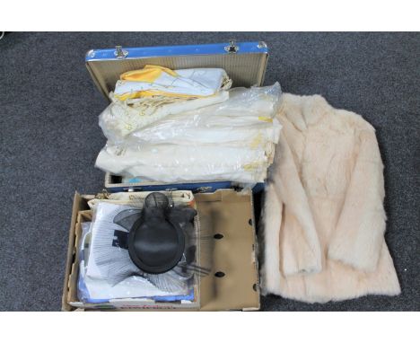 A case and a box of vintage linen and bedding, lady's fur coat, formal hat etc