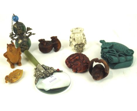 A selection of Oriental collectables, to include carved netsuke, stone and metal mounted double gourd snuff bottle, magnifier