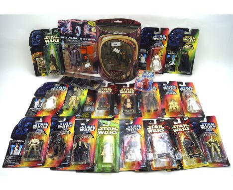 A collection of Star Wars figures, some talking examples, together with a Lord of The Rings figure of Merry and Pippin, in th