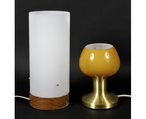 Two mid century glass lamps. A frosted glass cylinder lamp on a turned wooden base together with a small Italian table lamp w