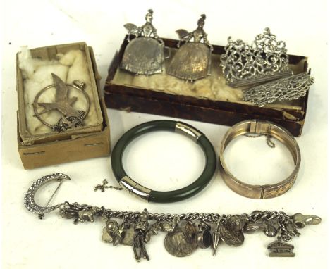 A collection of silver and white metal jewellery and related wares, to include a white metal charm bracelet, silver hinged ba