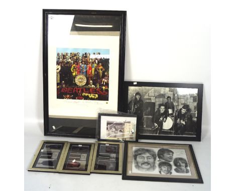 A collection of framed music and film memorabilia to include a 1993 Apple Corps Limited, limited edition print of Sgt. Pepper