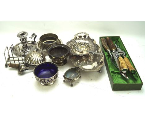 A collection of silver plate and metalware, including dishes, flatware, a candlestick, dishes and more, some examples by EPNS