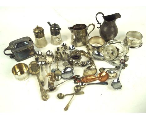 A selection of assorted silver plated wares, comprising mostly flatware, including caddy spoon, bangles and more