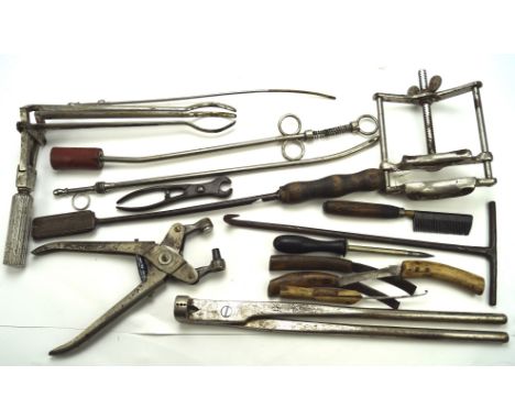 A group of 19th century and later horse and veterinary farm tools, including a castration tool and a teeth sander