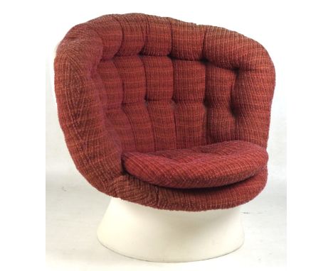 A 1960's vintage space age atomic accent chair, having an unusual fibreglass form with button backed woollen upholstered cush