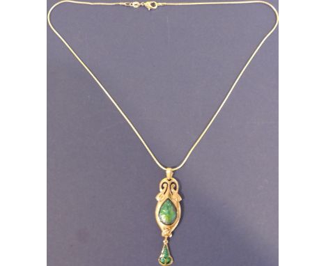 An Art Nouveau style silver and turquoise enamel pendant on fine chain. 