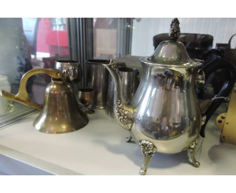 A brass hanging bell, a silver plated tankard, a pewter tankard and sundry metalware. 