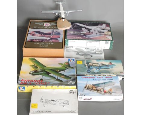 A desk top model of an Aeoflot twin engine aircraft, H. 16cm, together with seven other model aricraft, (8). 