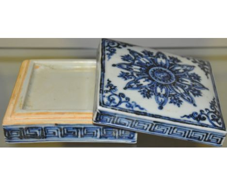A blue and white square porcelain inkwell, decorated with foliage and geometric design, W. 9cm.