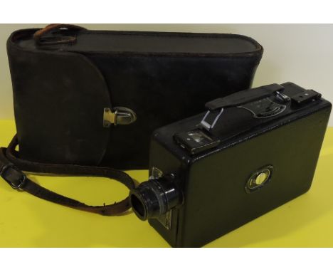 A Kodk cine camera model BB Junior, leather cased circa 1940 together with an Ensign Bellows camera, Ziess film splicer and o