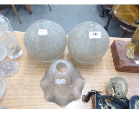 A PAIR OF GLASS CONE SHAPED ENCLOSED LIGHT SHADES AND AN ART NOUVEAU GLASS CAMPANA SHAPED LIGHT SHADE (3) 