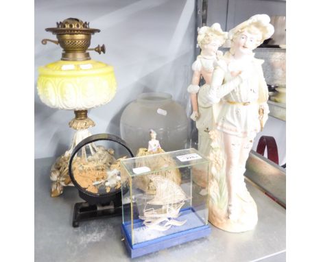 LADY AND GENTLEMAN BISQUE FIGURE'S,  CERAMIC OIL LAMP, CAROLINE FIGURE AND TWO OTHER ITEMS 