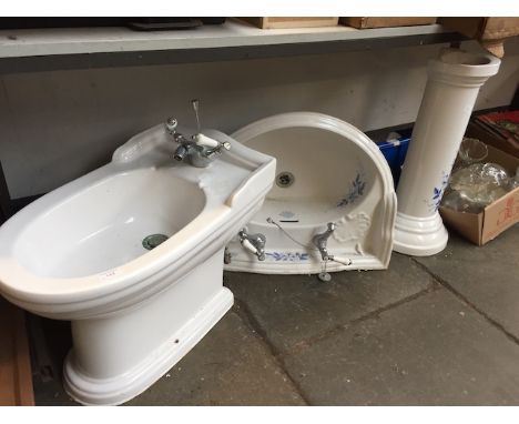 PEDESTAL WASH BASIN AND A BIDET
