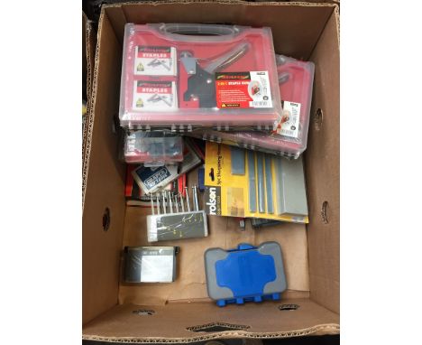 BOX OF MISC. TOOLS - STAPLE GUN, DRILL SETS, SHARPENING STONE SET ETC.