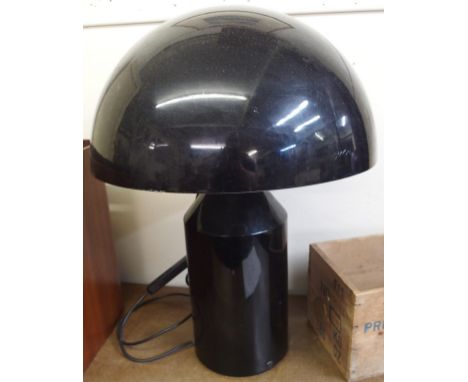 A black Oluce table lamp Condition Report: The lamp is in good overall condition with no damage to base or shade. Please note