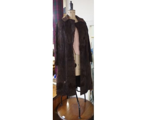 A Chil Daw pioneer mannequin and fur coat (2) Condition Report: Available upon request