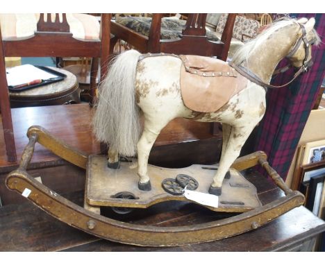A small Victorian rocking horse (def) Condition Report: The Horse is in good structural condition but has seem extensive wear