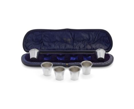 A cased set of six silver tot cupsunmarked, early 20th centuryEach tot cup having been formed from using an Edward VII 1902 c