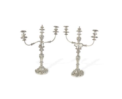 A pair of George III / IV silver three-light candelabraJohn Watson, Sheffield 1819 / 1821 The detachable branch sections with