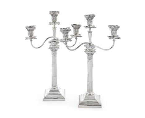 A pair of Victorian silver three-light candelabraJohn Aldwinckle &amp; Thomas Slater, London 1889, the branch sections 1888Wi