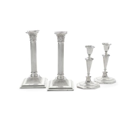 A pair of Edwardian silver candlesticks and a pair of  silver dwarf candlesticksfirst pair J Sherwood &amp; Sons, Birmingham 