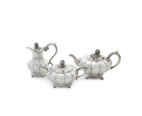 A 19th century Indian silver three-piece tea serviceHamilton and Co, marks, an elephant, urn, letter A, crescent tally mark a