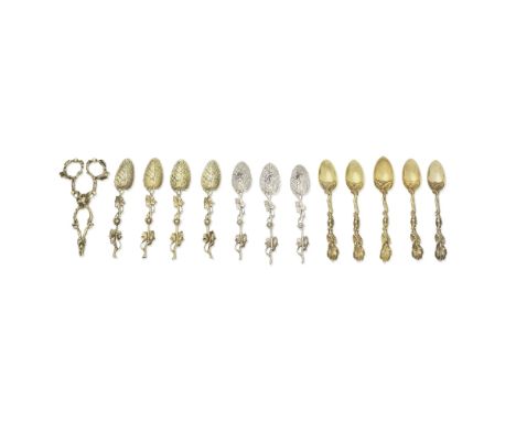 A pair of mid 18th century rococo silver-gilt sugar nips with matching teaspoonsvarious maker's and dates Of naturalistic for