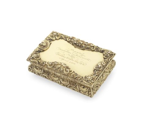 A Victorian silver-gilt snuff boxNathaniel Mills, Birmingham 1846 Rectangular, the cover with a plain panel with engraved pre