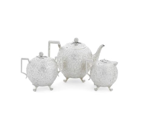 A 19th century Indian silver three-piece tea serviceeach piece only stamped O,M possibly for Oomersi Mawji, Bhuj, Kutchcompri