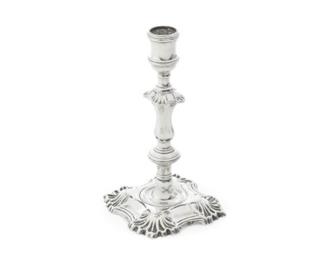 A George II Irish cast silver candlestickrubbed maker's mark, Dublin circa 1740 Of typical form, the whole cast and topped by