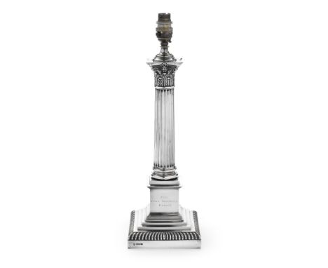 A silver Corinthian column lampHawksworth Eyre &amp; Co Ltd, Sheffield 1928 The plinth with inscription on a stepped square b