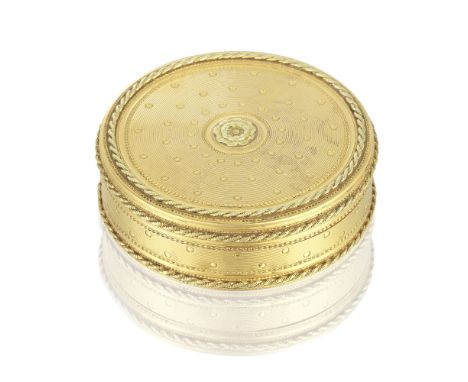 A Louis XVI circular gold snuff boxRene-Antoine Bailleul, Paris 1783 The cover with a central chased flowerhead on a pelleted