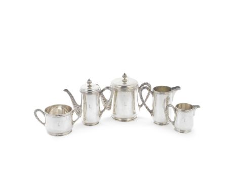 An Austro-Hungarian silver five-piece tea and coffee servicePest, pre 1922 3rd standard mark Cylindrical form with reed and r