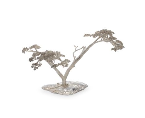 PATRICK MAVROS: a large 'Fari' Tree (Acacia) silver candelabraSouthern Rhodesia 2000, one sconce cover marked 2002 Sprawling 