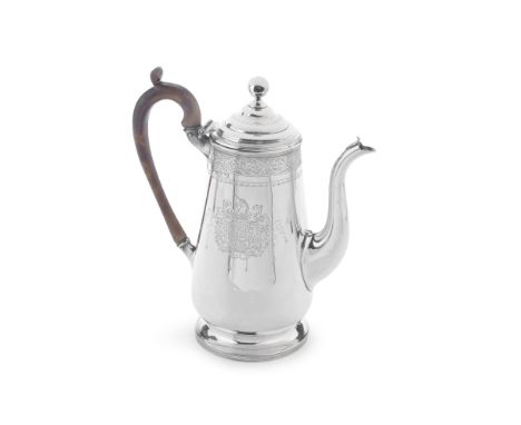 A George III silver coffee potThomas Law, Sheffield 1795Broad tapering cylindrical form, engraved with a band of foliate scro