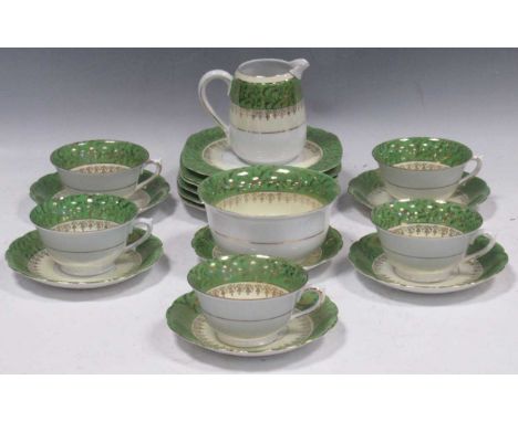 A green and gilt floral patterns Josef Lenhart Schneider part tea service, including tea cups, saucers, a milk jug, etc