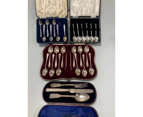 A collection of silver flatware and cutlery including cased teaspoons, cased christening set etc 34.5ozt gross weighable silv