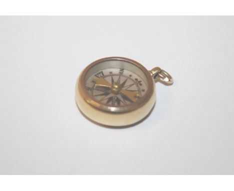 An 18ct gold cased watch fob compass with inset bloodstone.