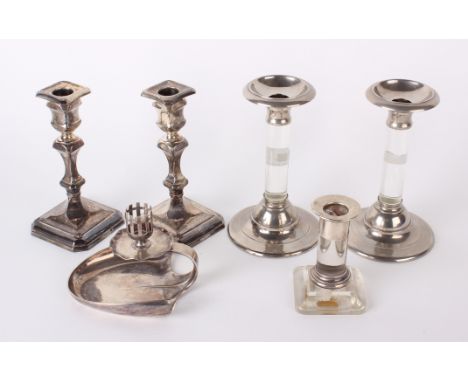 A pair of George VI silver mounted candlesticks Thomas Bradbury & Sons, Sheffield, 1939, with knopped columns and moulded bas