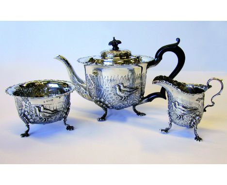 A Late Victorian three piece tea service by Nathan and Hayes, 1901, 27.3 troy oz. in total (including wooden finial) 