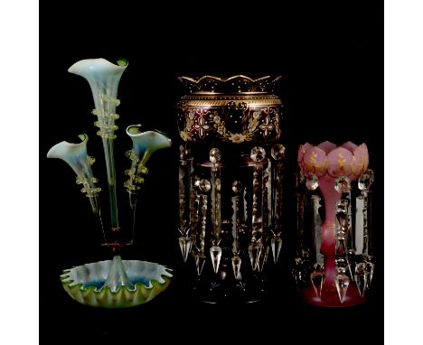 A pair of ruby glass lustres, gilt and enamelled bowls, 39cm; together with a pink opaque glass lustre, gilt detailing, 28cm;