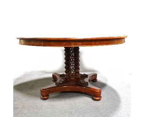 Victorian oak dining table, circular top, the column with barley twists and fretted panels, bun feet, diameter 139cm, height 