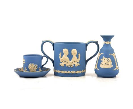 One box of Wedgwood pale blue jasperware items, to include Flower Vase and Grid; Royal Wedding Loving Cup; Cameo Vase; Fluted